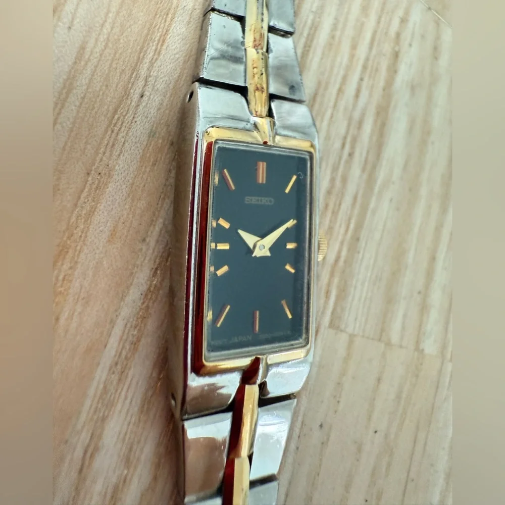 Seiko ladies two tone rectangular black dial dress watch NEW BATTERY
